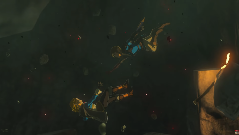 Princess Zelda falls backwards, Link falls after her, both trying to reach each other, in a dark cave.