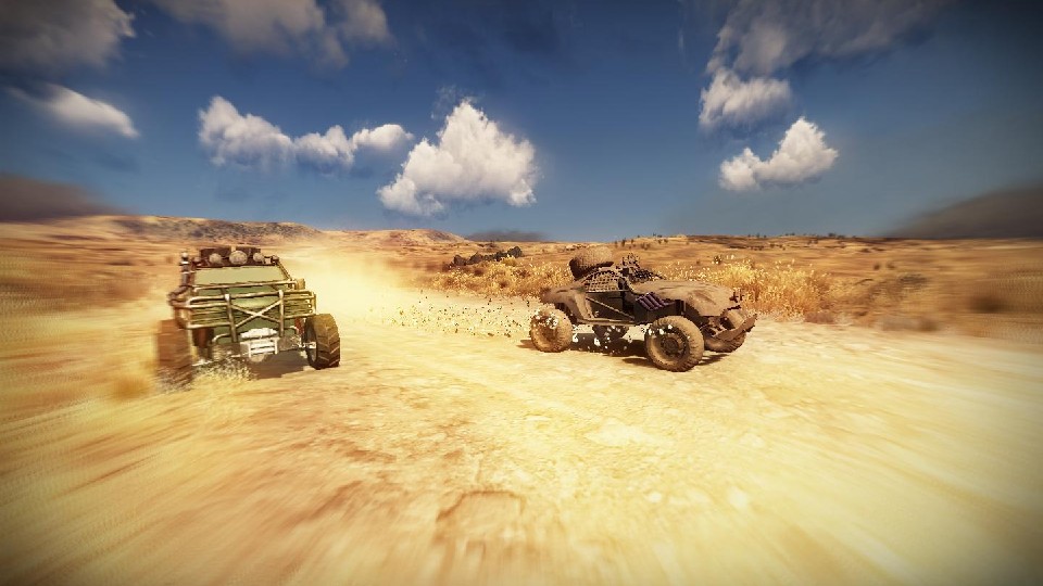 Two cars are speeding down a sandy road. Both heavily modified and covered in extra armor and dirt. Prairie with patches of small vegetation stretches far into the bright blue sky with fluffy white clouds.