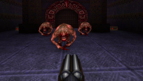 First-person view, with only a double-barreled shotgun and no visible UI. Three fiends, ape-like enemies, with dirty beige skin, single talon-like hands, hoofed legs, mouths with huge teeth occupying half of their heads, stand between the player and the exit gate.