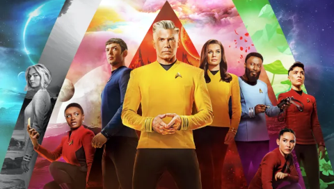 Main characters standing or kneeling in action or heroic poses against a background of nested Starfleet arches, each showing a different world.