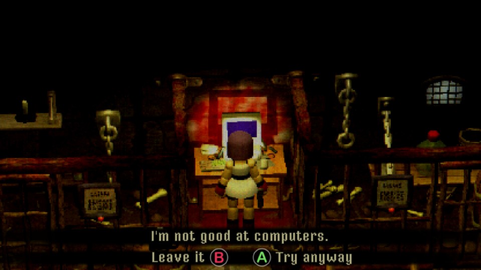 The look of the game is very pixelated and grainy. Dark-haired woman in a white short dress, black shorts and red gloves is standing in a medieval looking dungeon. There are cages, chains on the walls and bones on the floor. She stands in front of a 90’s looking computer on an office desk and says “I’m not good at computers”. There are two button prompts for the player: “(B) Leave it” and “(A) Try anyway”.