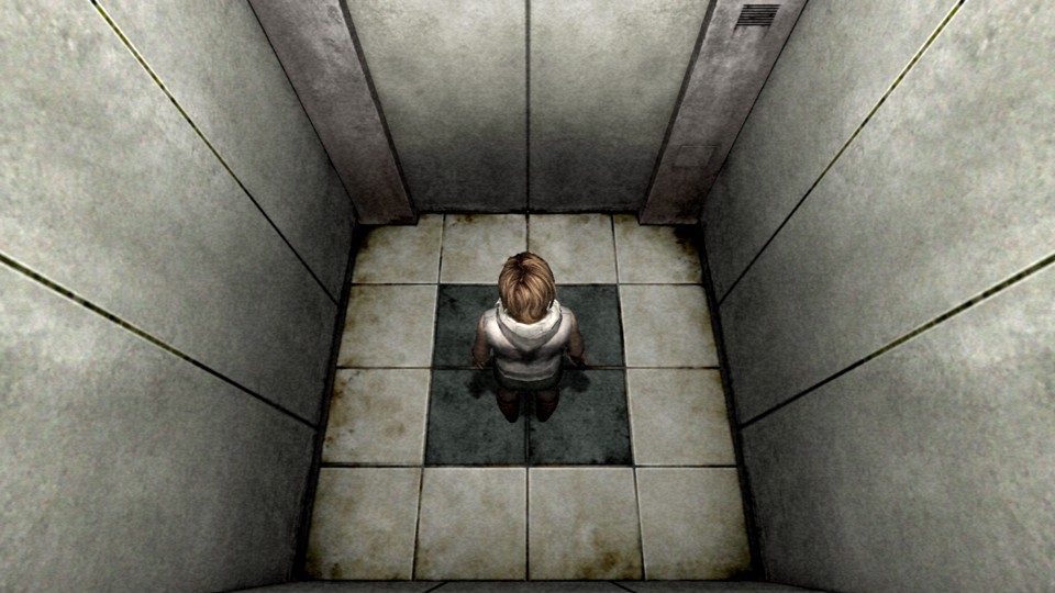 Heather, a young woman with short blond hair, wearing a puffy vest and a denim skirt, stands in a dirty gray elevator. The shot is from the top back of the elevator and is very geometric.