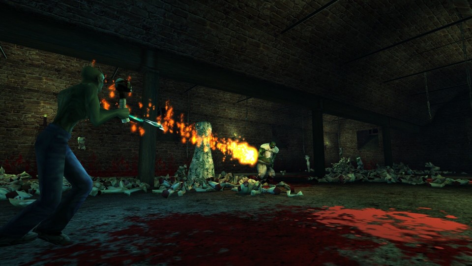 A room with a domed brick ceiling and brick walls. There are plenty of body parts – heads, arms, legs – and blood on the floor. The protagonist of the game, Shadow Man, a black, sinuous man in blue jeans who holds a gun and a magic weapon shaped like a human skull connected to a spine. He shoots at an enemy, a hulking man in dirty white clothes with a leather hood covering his head, who has a metal hook in each hand.